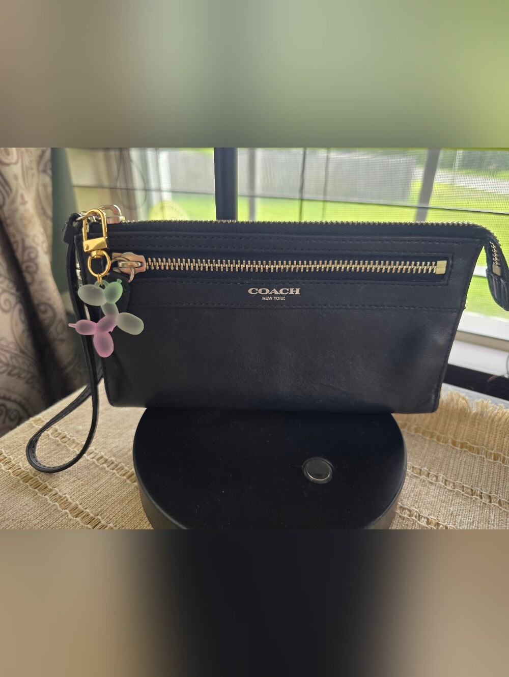 Coach Black Leather Wristlet with Gold Zipper and Pastel Charm